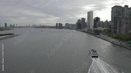 Rear view to boat moving on east river New York