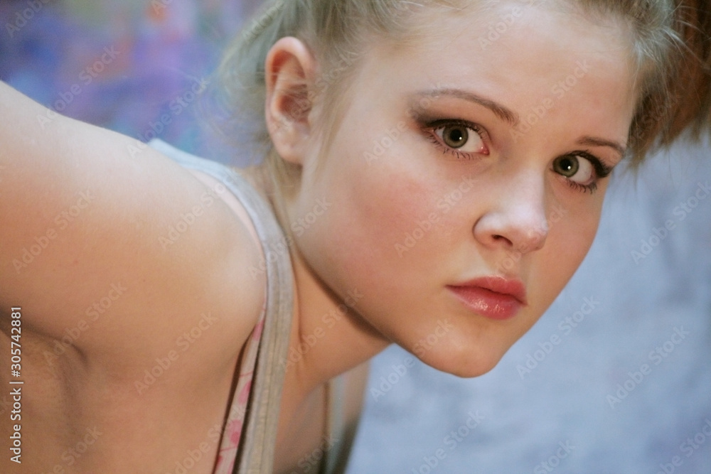 Portrait of a natural blonde. Teen girl leaned forward Stock Photo