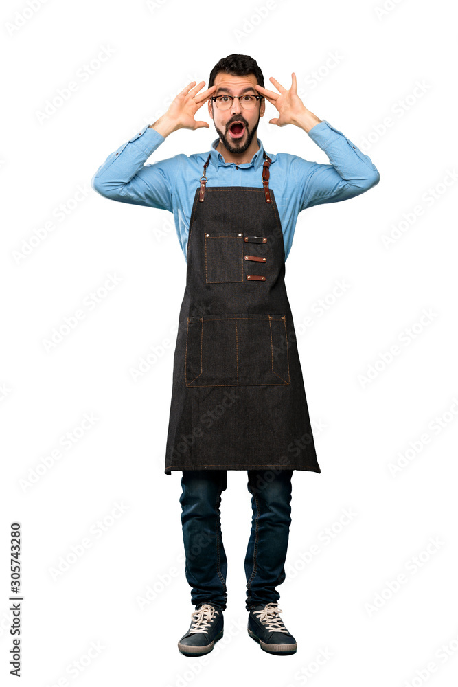 Full-length shot of Man with apron with surprise expression over isolated white background Full-length shot of Man with apron with surprise expression over isolated white background