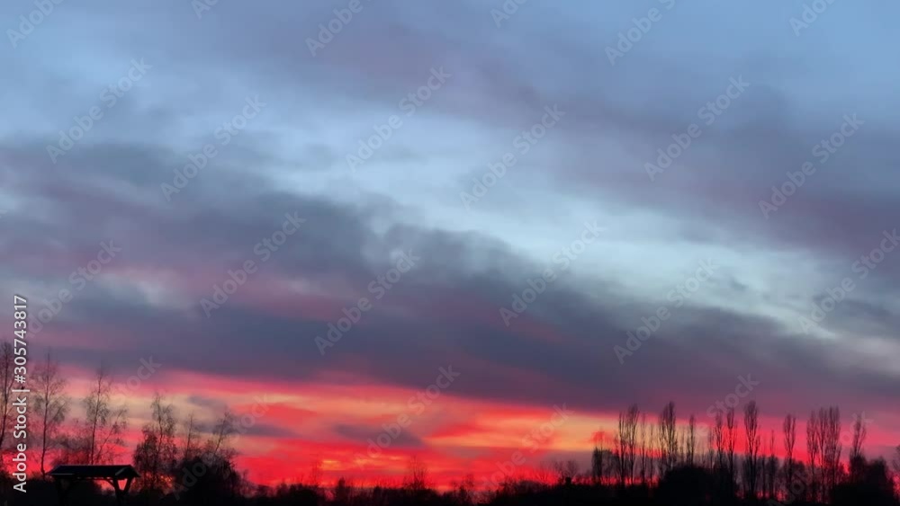 Intense red and orange dusk of Autumn season in a cool evening. Intense red and orange dusk of Autumn season in a cool evening.