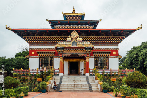 Schilderij op canvas Colorful decorated facade in Bhutanese style of The Royal Bhutanese Monastery with copy space in Bodh Gaya, Bihar, India