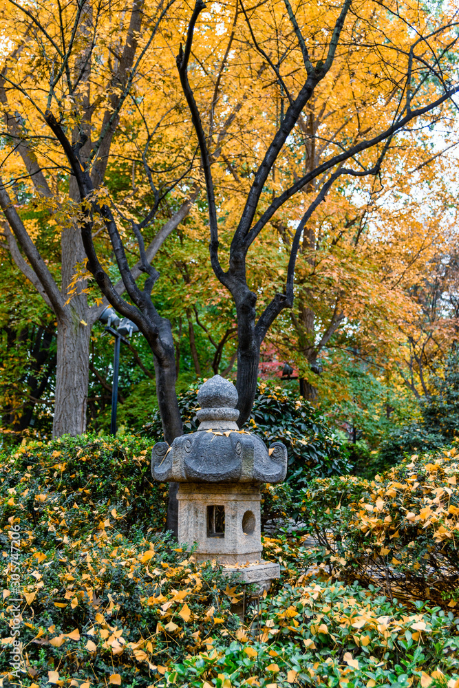 small shrine in a park near the giant wild goose pagoda in Xi'an, China in autumnal environment small shrine in a park near the giant wild goose pagoda in Xi'an, China in autumnal environment