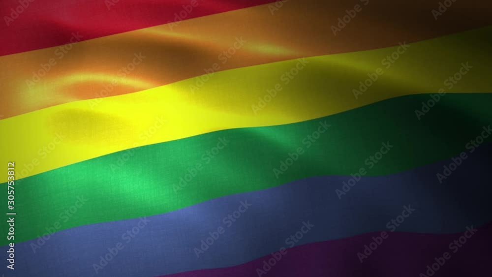 The rainbow flag, LGBT pride flag or gay pride flag waving at wind The rainbow flag, LGBT pride flag or gay pride flag waving at wind