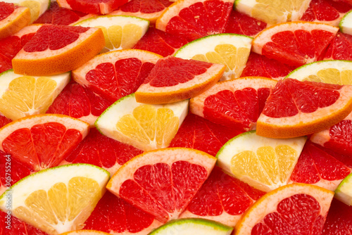 Pomelo and grapefruit slices background.