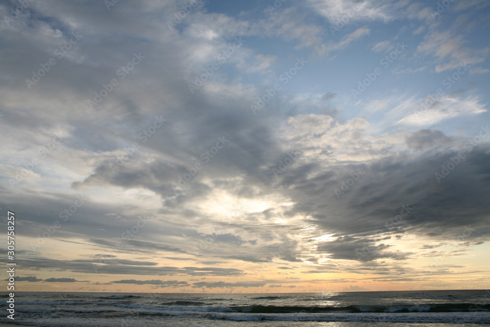 Cloudy sunset at the beach 