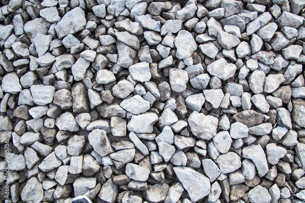 Ground granite stones as gray background. Ground granite stones as gray background.