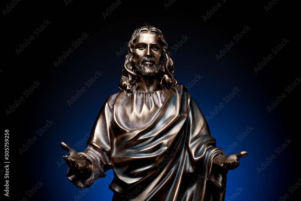 A small statue of Jesus Christ on the Cross