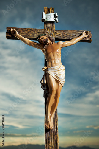 Slika na platnu A small statue of Jesus Christ on the Cross