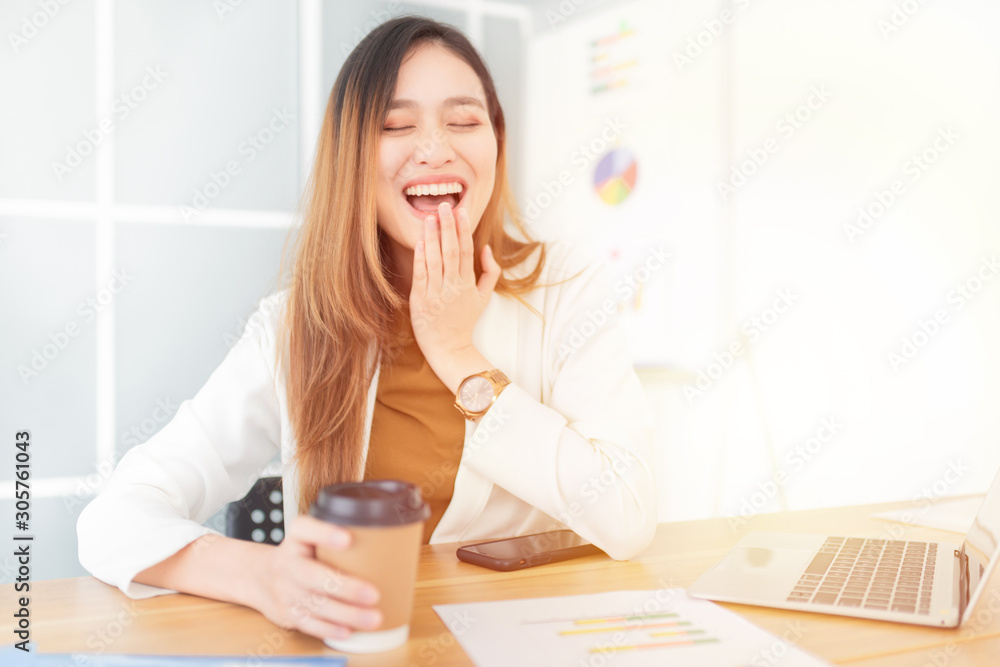 attractive asian officer laughing in relax time, asian female feeling happy in office, she use hand close her mouth, happiness organization attractive asian officer laughing in relax time, asian female feeling happy in office, she use hand close her mouth, happiness organization