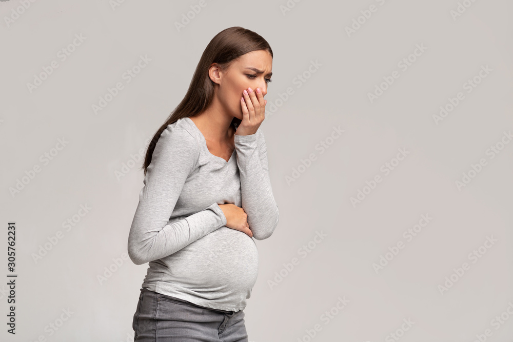 Pregnant Lady Feeling Sick Having Nausea Standing On Gray Background Pregnant Lady Feeling Sick Having Nausea Standing On Gray Background