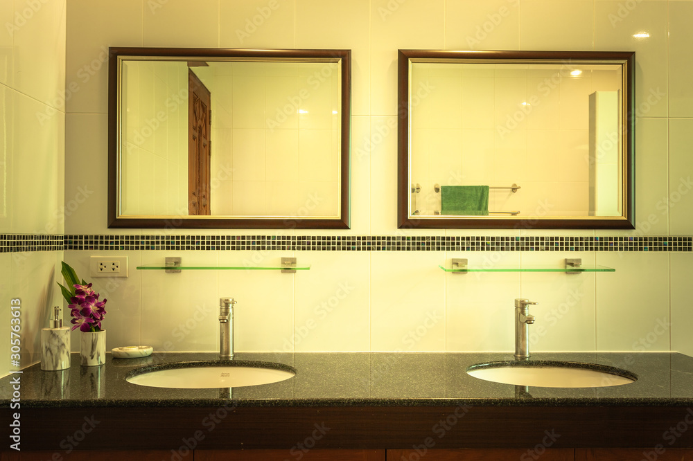 Double mirror and double basin in bathroom