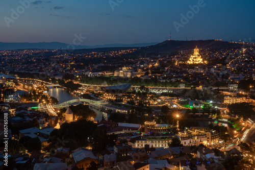 Night view of Tbilisi with Sameba (Trinity) Church and other landmarks. Beautiful Place to travel. © k_samurkas