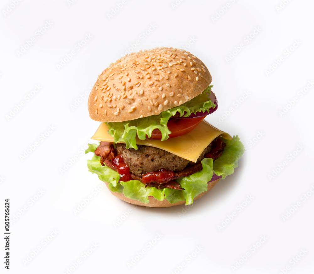 Homemade hamburger on white background. Hamburger with sesame seeds and bacon, greens and cheese. Homemade hamburger on white background. Hamburger with sesame seeds and bacon, greens and cheese.