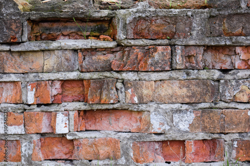 Brick wall red of an old house background texture photo