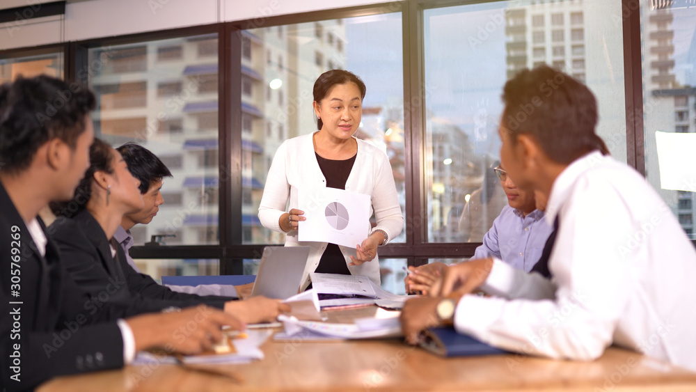 People discussing together in conference room People discussing together in conference room