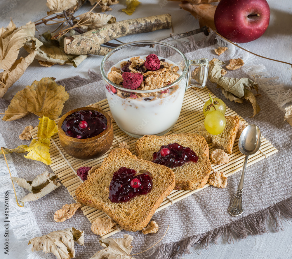 autumnal food background with rusks and jam