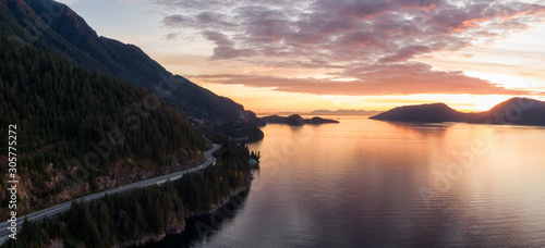 Sea to Sky Hwy in Howe Sound near Horseshoe Bay, West Vancouver, British Columbia, Canada. Aerial panoramic view during a colorful sunset in Fall Season.