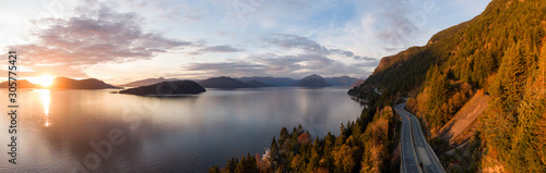 Sea to Sky Hwy in Howe Sound near Horseshoe Bay, West Vancouver, British Columbia, Canada. Aerial panoramic view during a colorful sunset in Fall Season.