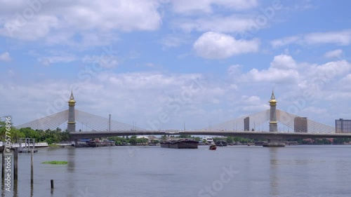 Maha Chesadabodindranusorn Bridge over Chao Phraya river in Nonthaburi, Thailand. Its structure is cable-stayed extradosed photo