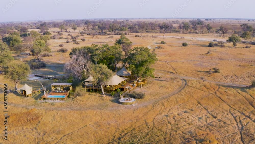 Aerial zoom in view of Tuludi Safari Camp, Okavango Delta, Botswana Aerial zoom in view of Tuludi Safari Camp, Okavango Delta, Botswana