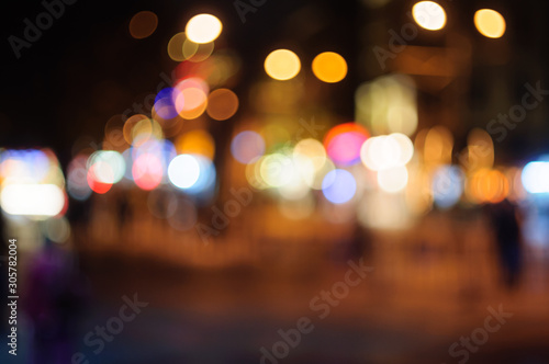 Blurred image of lights on a night street.