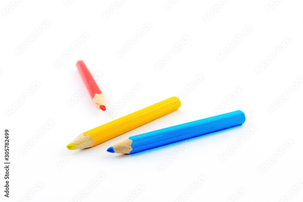 close up of colour pencils isolated on white background . close up of colour pencils isolated on white background .