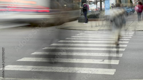 Pedestrians Cross A Busy Chicago Street