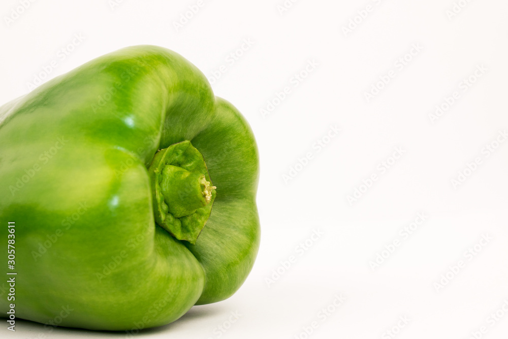 Green pepper on a white background. Green pepper on a white background.