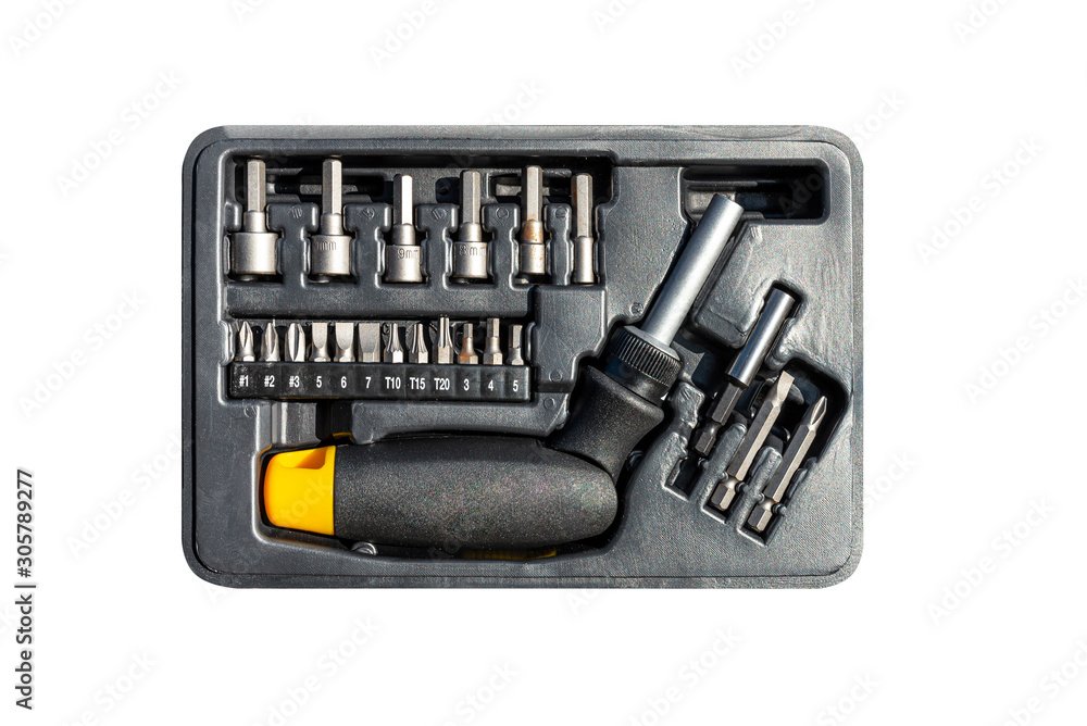 Bit set and socket with ratchet screwdriver in black packaging, isolated on a white background with a clipping path. Bit set and socket with ratchet screwdriver in black packaging, isolated on a white background with a clipping path.