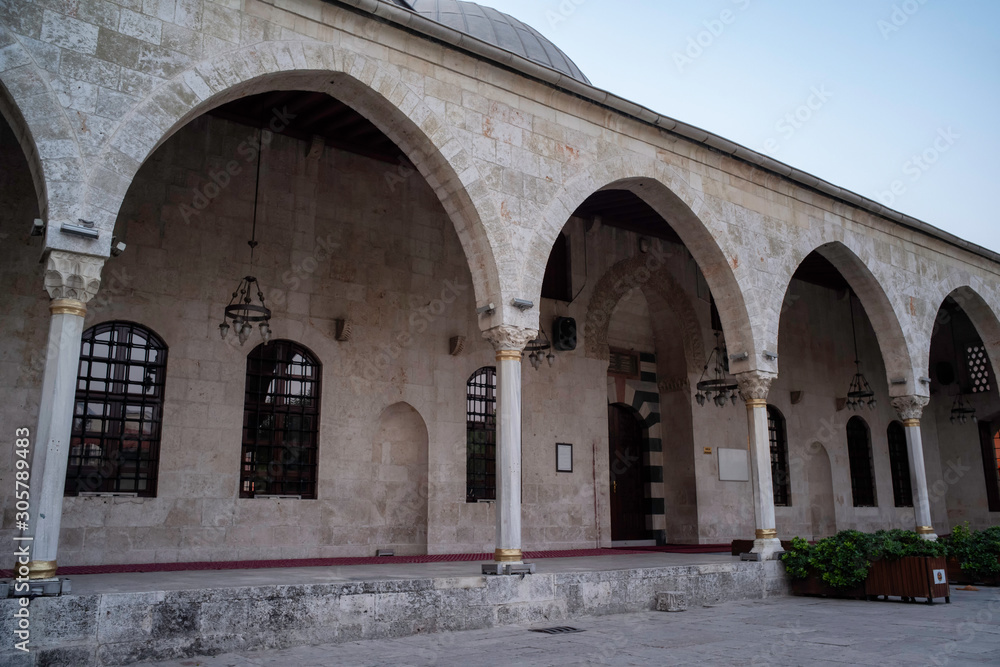 front wiev with the entrance foor of habibi neccar mosque froım the courtyard