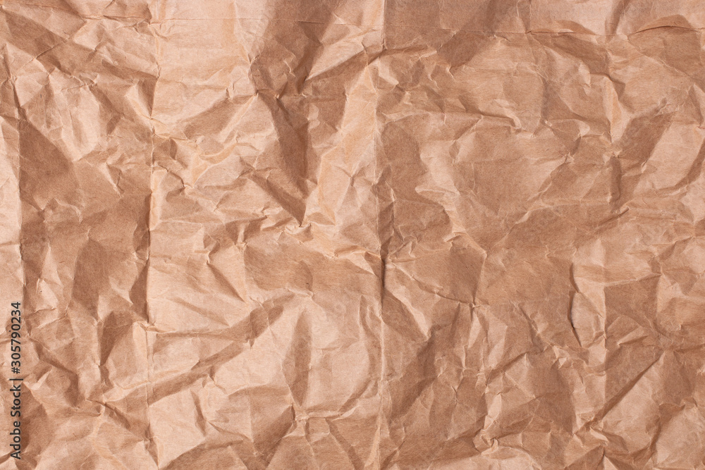 The texture of crumpled brown crumpled paper