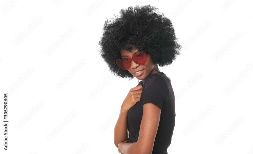 Smiling afro girl in red glasses and black shirt isolated on white background. Smiling afro girl in red glasses and black shirt isolated on white background.