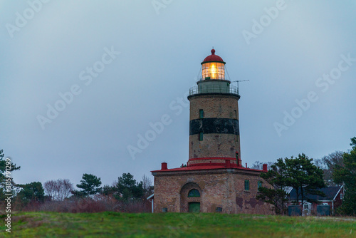 Falsterbo lighthouse in southern Sweden, built in 1796, still shines for the ships out in oresund in the evenings and nights between Sweden and Denmark