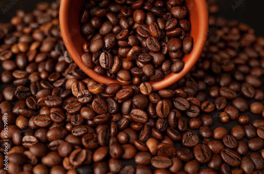 coffee beans on stone background, close-up