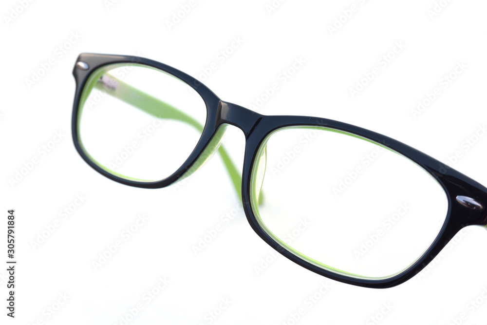 Modern reading glasses in green color with black trim. Modern reading glasses in green color with black trim.