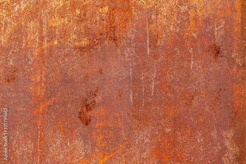 Abstract background texture of an old shabby rusty sheet of metal.