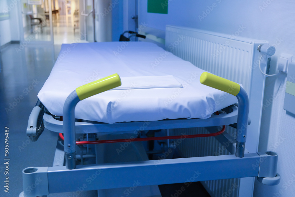Naklejka premium A bed for patients in the hospital corridor. Close up.