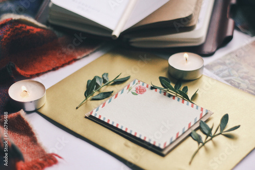 Obraz na płótnie Opened book and leaves, postcard, autumn home comfort w salonie