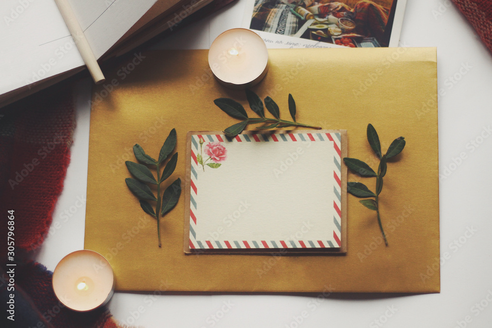 Opened book and leaves, postcard, autumn home comfort