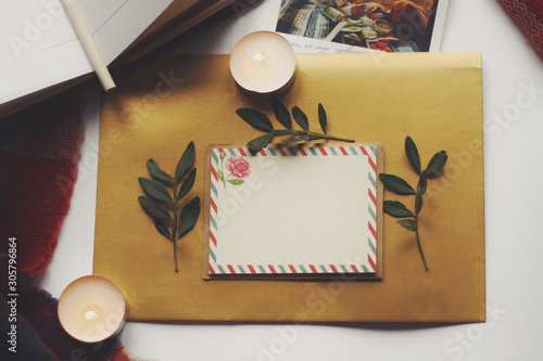 Opened book and leaves, postcard, autumn home comfort
