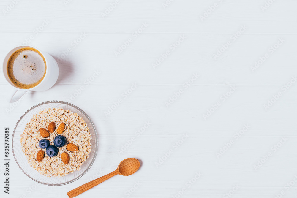 Bowl of oatmeal with nuts and berries Bowl of oatmeal with nuts and berries