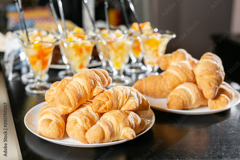 Breakfast buffet. Fresh pastry, crispy morning croissants, breakfast in hotel. Dessert fruit cocktail in cups Breakfast buffet. Fresh pastry, crispy morning croissants, breakfast in hotel. Dessert fruit cocktail in cups