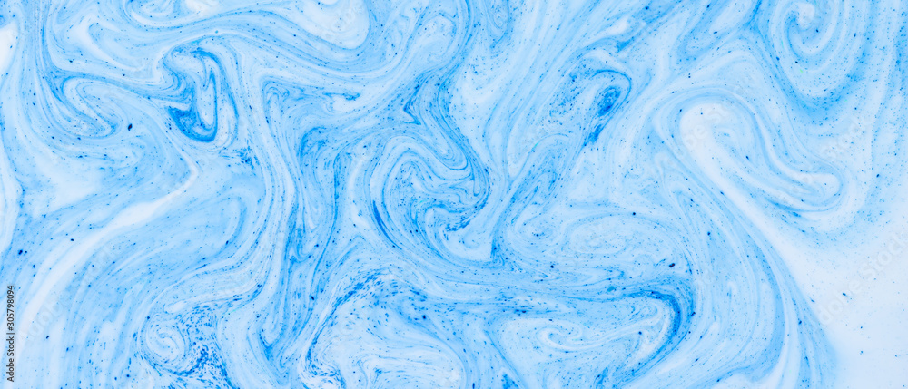 Fluid Art with white blue color. Abstract multicolored background. Blue white texture. Colored paint stains in liquid. Marble art. Fantastic iridescent colors
