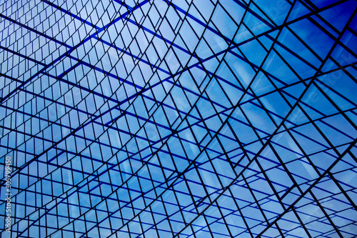 Collage of structural glazing facades. Modern architecture fragment with glass ceiling, roof or wall made of transparent panels. Abstract geometric background with complex grid pattern.
