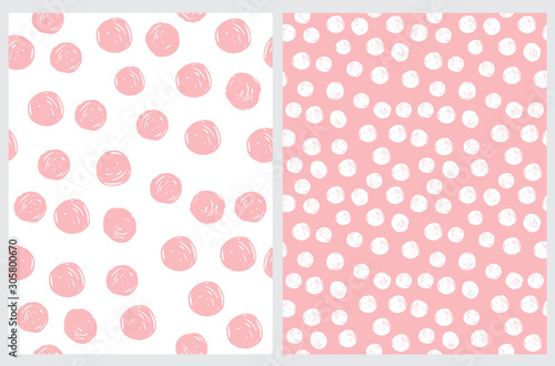 Simple Seamless Vector Pattern with Hand Drawn Irregular Dots. Pink Brush Dots Isolated on a White Background. White Polka Dots on a Light Pink Background. Infantile Style Abstract Dotted Print. © Magdalena