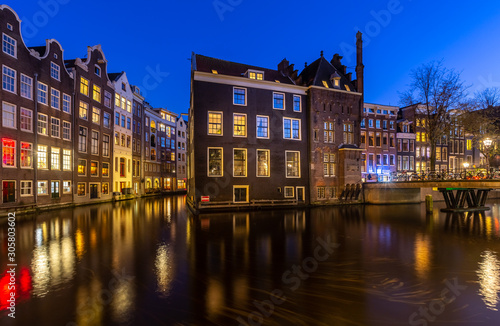 Red light district medival building at night. Amsterdam, Netherlands