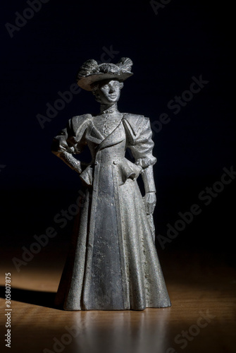 Victorian Lady standing wearing hat this figure is made of white metal