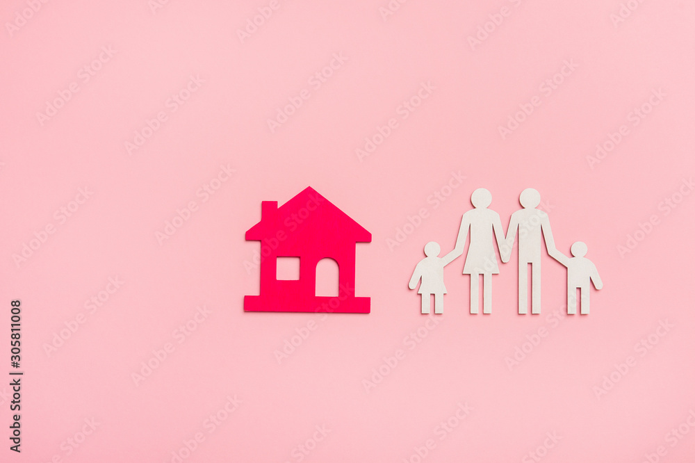 Family figures with house on pink background. Family figures with house on pink background.