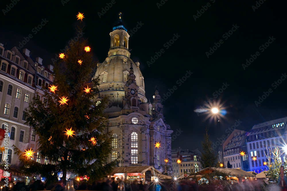 Christmas market in Dresden with the church Frauenkirche in background