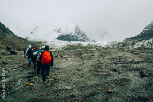 PARQUE LOS GLACIARES,ARGENTINA-MARCH,20,2008: a group of tourists visits the laguna torre part of a tour in the parque los glaciares, a day tour from el chalten